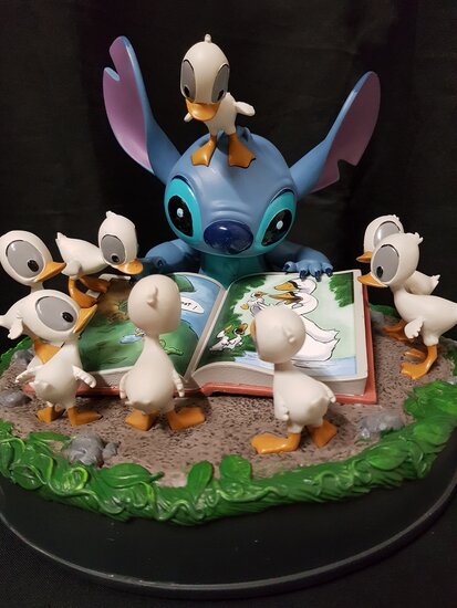 DISNEY PARIS STITCH AND shops DUCKS MEDIUM FIGURINE